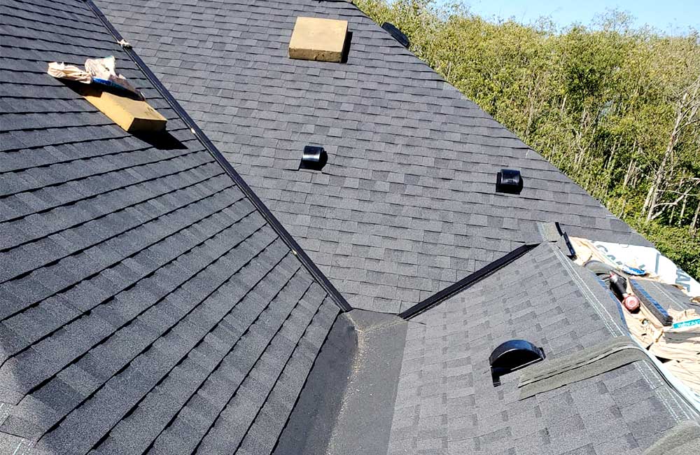 Asphalt shingle moire black roof and dead valley